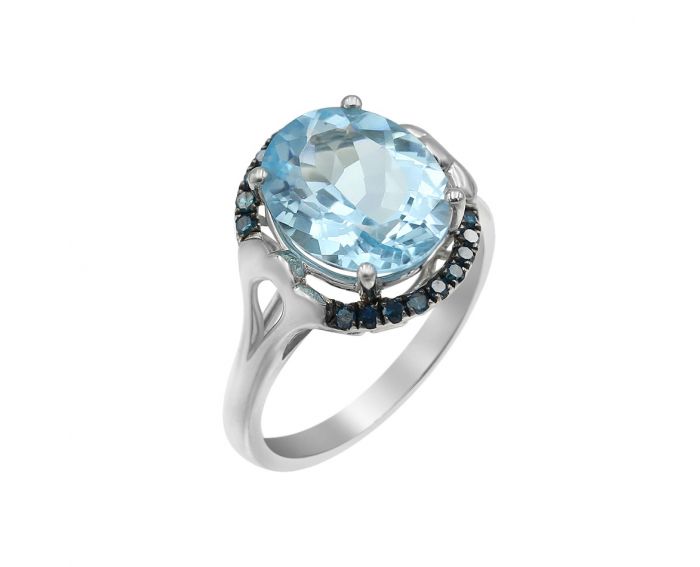 White gold ring with diamonds and topaz