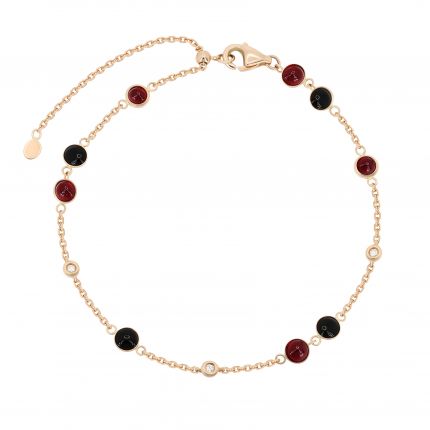 Bracelet with diamonds, onyx and rubies in pink gold