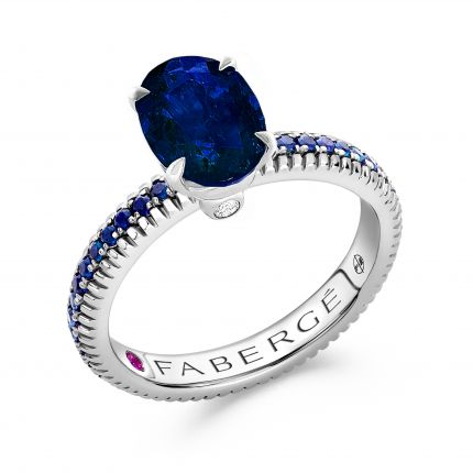 A ring with sapphires in white gold 8-226 334