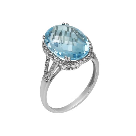 White gold ring with diamonds and topaz