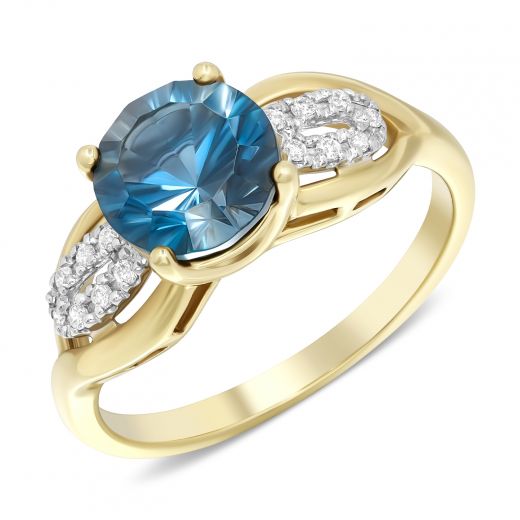 Ring with diamonds and blue topaz in yellow gold