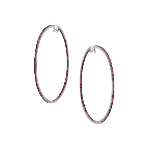 Earrings in white gold with rubies