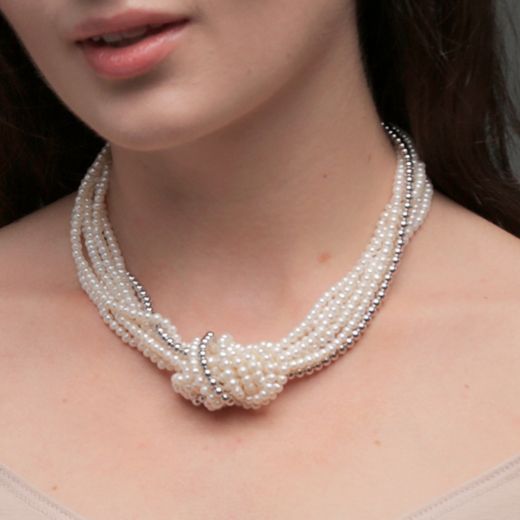 Pearl necklace with a string of silver beads