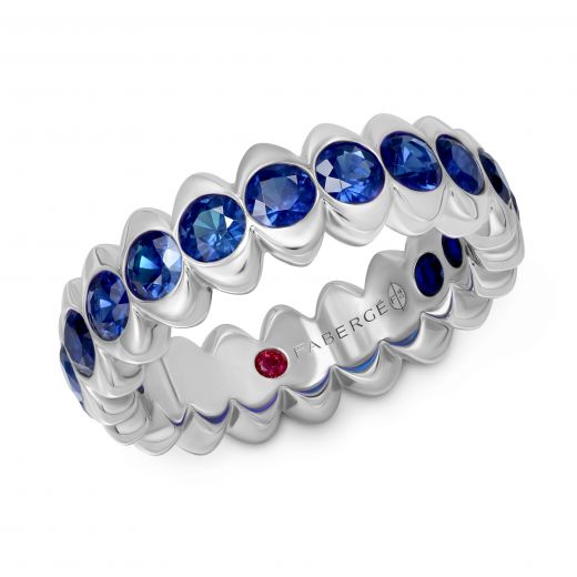 Ring with blue sapphires and hidden ruby ​​8-226 729