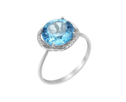 White gold ring with diamonds and topaz