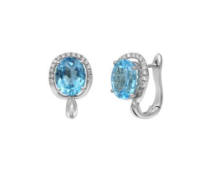 Earrings in white gold with diamonds and topaz