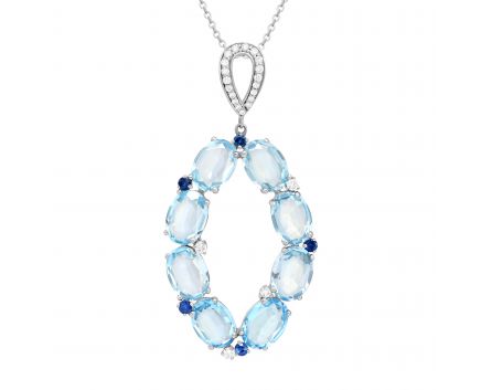 Pendant with diamonds, sapphires and topazes in white gold 1-176 069