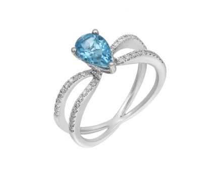 White gold ring with diamonds and topaz