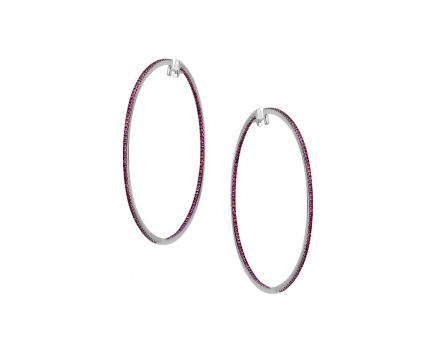 Earrings in white gold with rubies