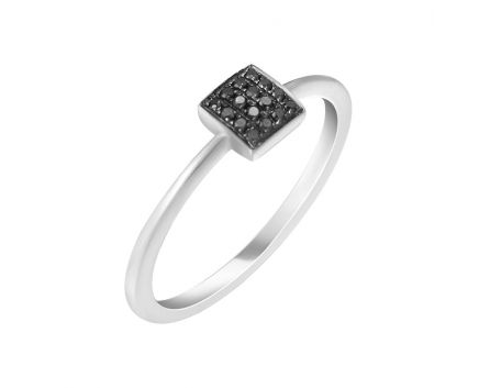 White gold ring with black diamonds