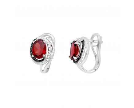 Earrings with diamonds and garnets in white gold 1-206 674
