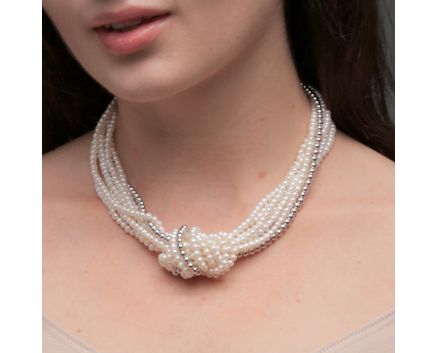 Pearl necklace with a string of silver beads